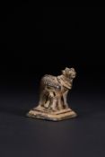 AN INDIAN CAST BRONZE RITUAL FIGURE OF KAMADHENU AND CALF, 19TH CENTURY.