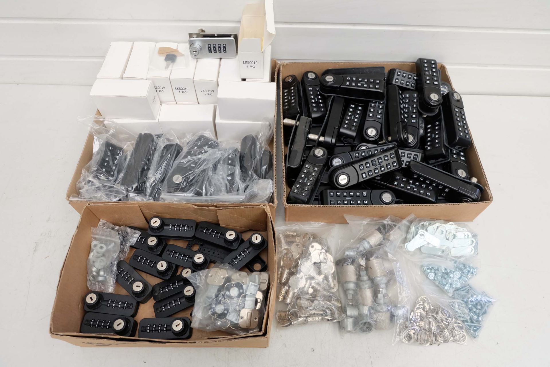 Quantity of New & Used Locks. Mixture of Battery & Combination.