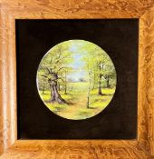 John F Smith (British, b. 1934), Royal Worcester artist, Circular landscape of a forest path, Signed