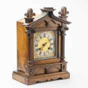 A Continental cabinet mantle clock, the mahogany case in the Neo-Renaissance style, the square
