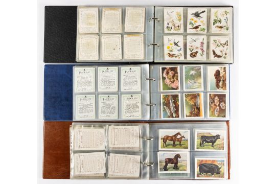 Cigarette card collection with sets part sets and types of mainly larger  cards, in three albums a