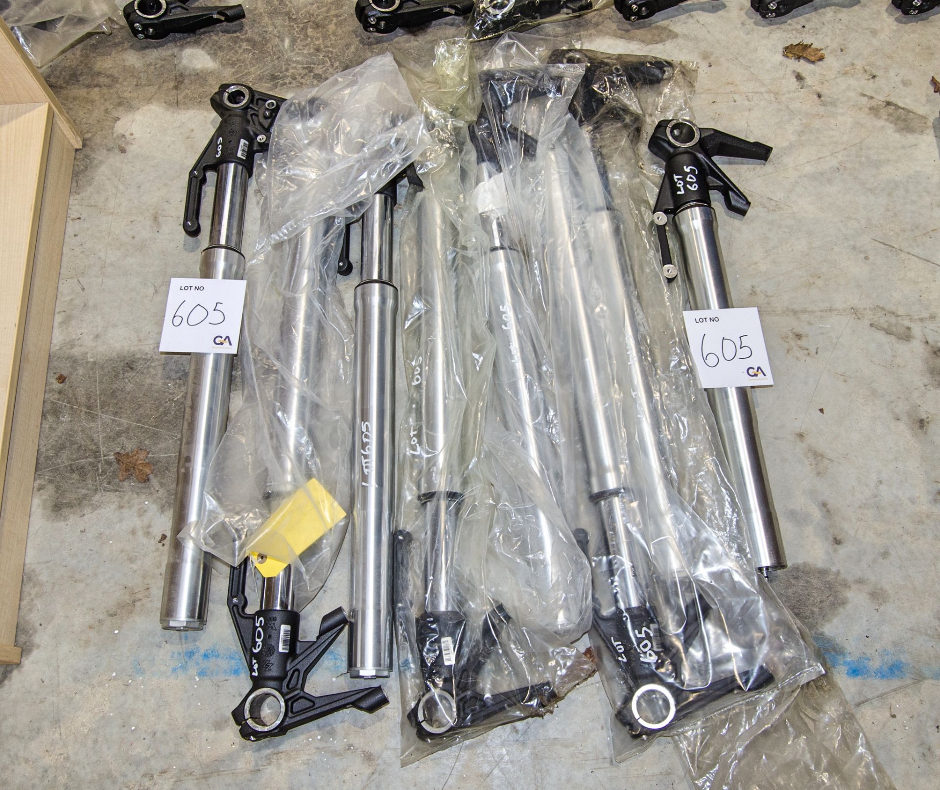 8 - used CCM Spitfire front suspension legs in varying states of repair