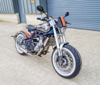 CCM Spitfire Bobber 600cc motorcycle VIN: SMZHC60GW25A00004 Colours: Chrome/orange tank, blue frame,
