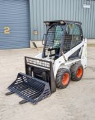 Bobcat 453 diesel driven skidsteer loader S/N: 561811420 Recorded Hours: 1579 c/w forks & riddle