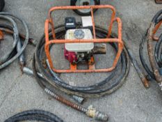 Petrol driven concrete poker drive unit c/w 2 - poker flexes 02SE65