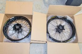 New and unused Haan and Excel front and rear wheel assembly, black rim, black hub, silver spokes and