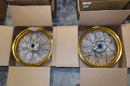 New and unused Haan and Excel front and rear wheel assembly, gold rim, silver hub, silver spokes and