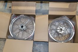 New and unused Haan and Excel front and rear wheel assembly, silver rim, silver hub, silver spokes