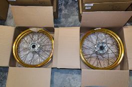 New and unused Haan and Excel front and rear wheel assembly, gold rim, silver hub, silver spokes and