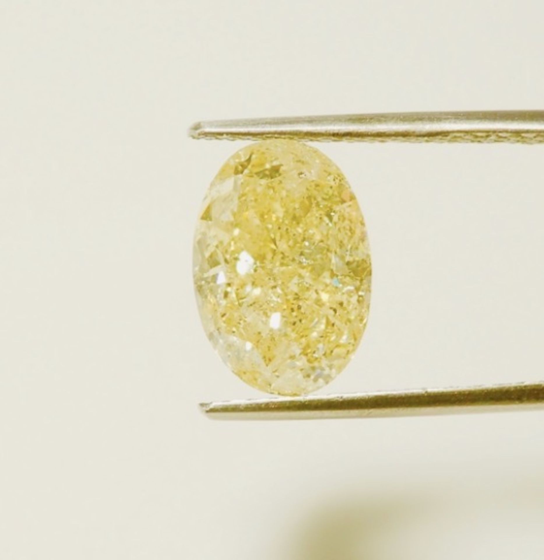 ** ON SALE **Oval Cut ( Natural Diamond ) 5.20 Carat Fancy Yellow Colour I3 Clarity Polish