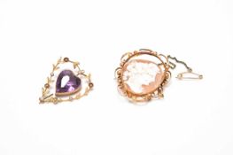 A pendant and a brooch