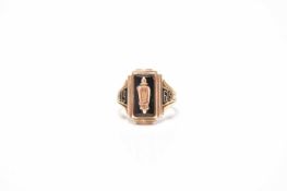 An American yellow metal and onyx class ring