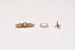 A brooch, a ring and a stud