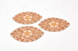 Three embroidered and jewelled textile panels