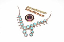 Two bracelets, a necklace and a compact