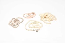 Four cultured pearl necklaces