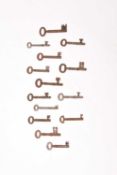 A group of fourteen 18th century and later iron warded keys