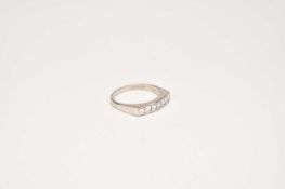 An 18ct white gold square cut diamond half eternity ring