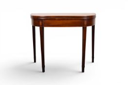 A George III inlaid mahogany fold-over tea or card table