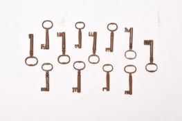 A group of twelve 18th century and later iron warded keys