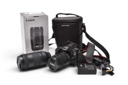 A Canon EOS 80D digital SLR camera and associated photographic equipment