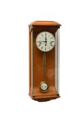 A modern Franz Hermle beech and walnut cased wall clock