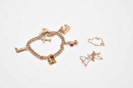 A 9ct gold bracelet with attached charms