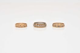 Three 9ct gold stone set eternity rings