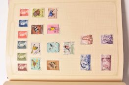 World collection of stamps in 3 albums