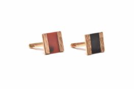A pair of 9ct gold hardstone set cufflinks