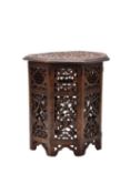 An Indian carved hardwood octagonal occasional table