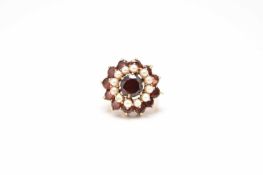 A garnet and cultured pearl cluster ring