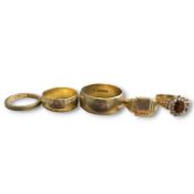 A group of five 9ct gold rings. Featuring a garnet and synthetic spinel set cluster ring, with