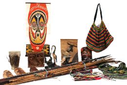 A mixed lot to include: a Papua New Guinea carved wooden snakes head walking stick / ceremonial