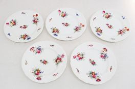 Five Coalport porcelain dessert plates, with embossed border and decorated with floral sprays. Circa