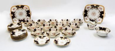 Twelve piece Coalport decorative tea service with two biscuit/sandwich plates.
