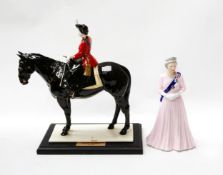Coalport figurine of Queen Elizabeth II trooping the colour 87/450, on stand along with a Coalport