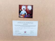 A framed and glazed shirt and montage, Lionel Messi "UEFA Champions League Winners 2011", signed