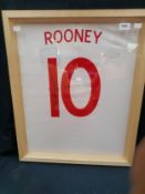 A framed and glazed shirt, Wayne Rooney, signed with certificate of authenticity. Measuring