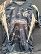 A signed England training shirt Nationwide sponsor, signed by sixteen.