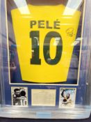 A framed and glazed shirt and montage, Pele "Brazil and Football Legend", signed with certificate of