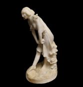 A 19th Century alabaster figure of an Art Nouveau lady leaning in a naturalistic pose, in the