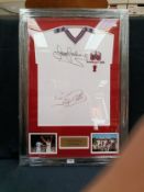 A framed and glazed shirt and montage, Trevor Brooking and Billy Bonds "West Ham United Wembley