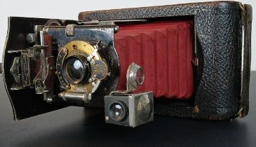 Dr. Wakefield’s cameras and photographs: Cameras: Cine-Kodak Model B, 16mm movie camera, made in the
