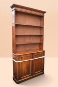 Tall Victorian mahogany three-shelf bookcase/cupboard, open book shelves with two panelled bottom