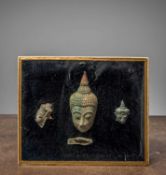 (R) A COMPOSITION OF BRONZE BUDDHA HEADS AND HAND, THAILAND, AYUTTHAYA PERIOD