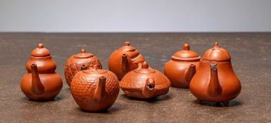 (R) A GROUP OF SEVEN YIXING MINIATURE TEA POTS, CHINA, 19TH CENTURY