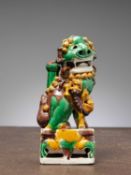 (R) A FO-DOG, SANCAI GLAZE, KANGXI PERIOD, CHINA, 1700 (RESTORED)