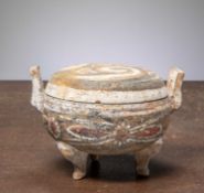 (R) A PAINTED EARTHENWARE TRIPOD VESSEL , CHINA HAN DYNASTY (206 BC – 220 AD)