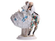 A MEISSEN PORCELAIN FIGURAL GROUPING OF HARLEQUIN AND COLUMBINE FROM THE RUSSIAN BALLET "KARNEVAL", 